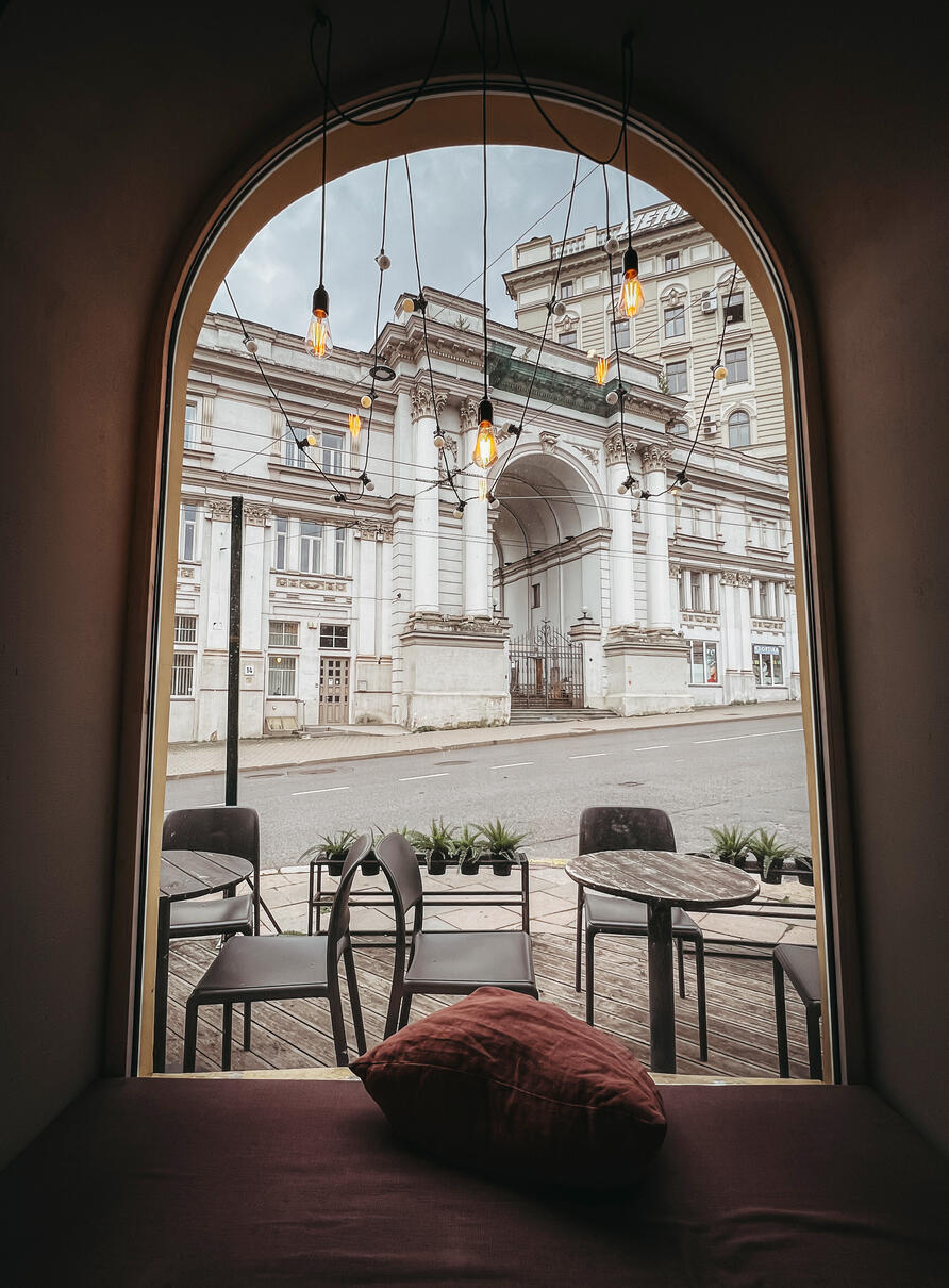 caffeine teatro street view through window