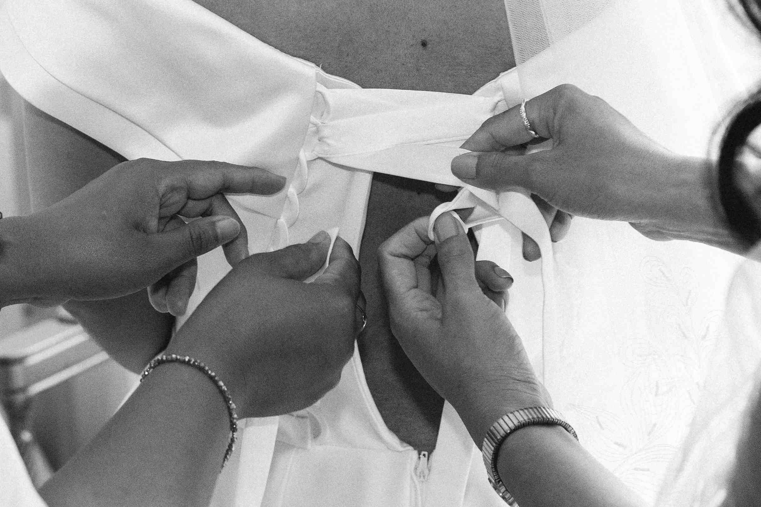 bride wedding dress tying villa gastel italy
