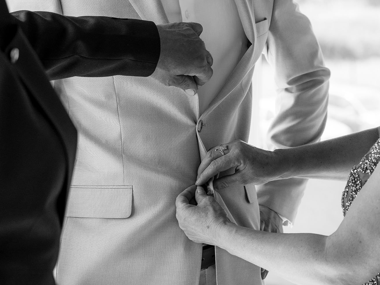 parents hands photo groom preparation photoshoot