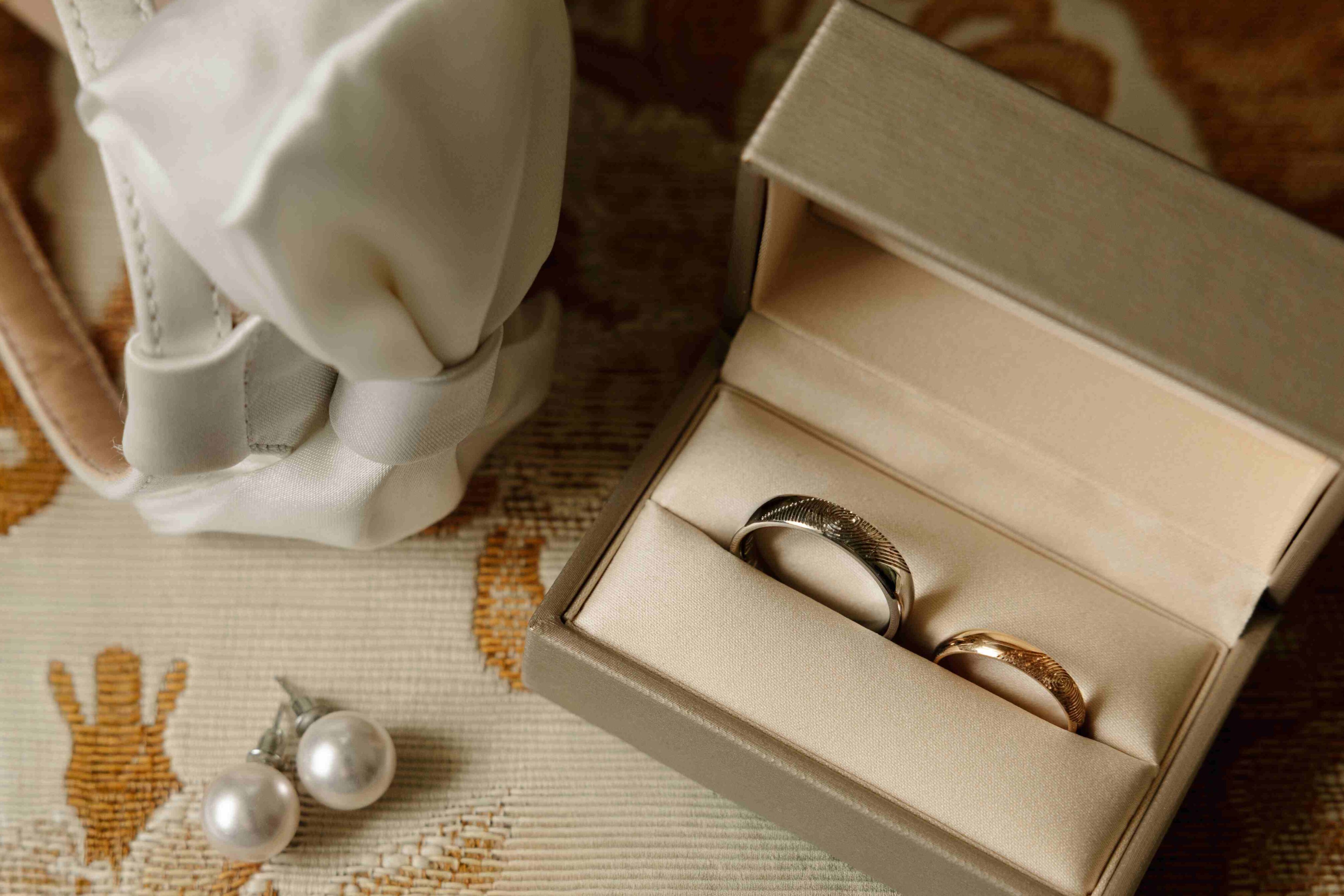 wedding rings with fingerprint close up