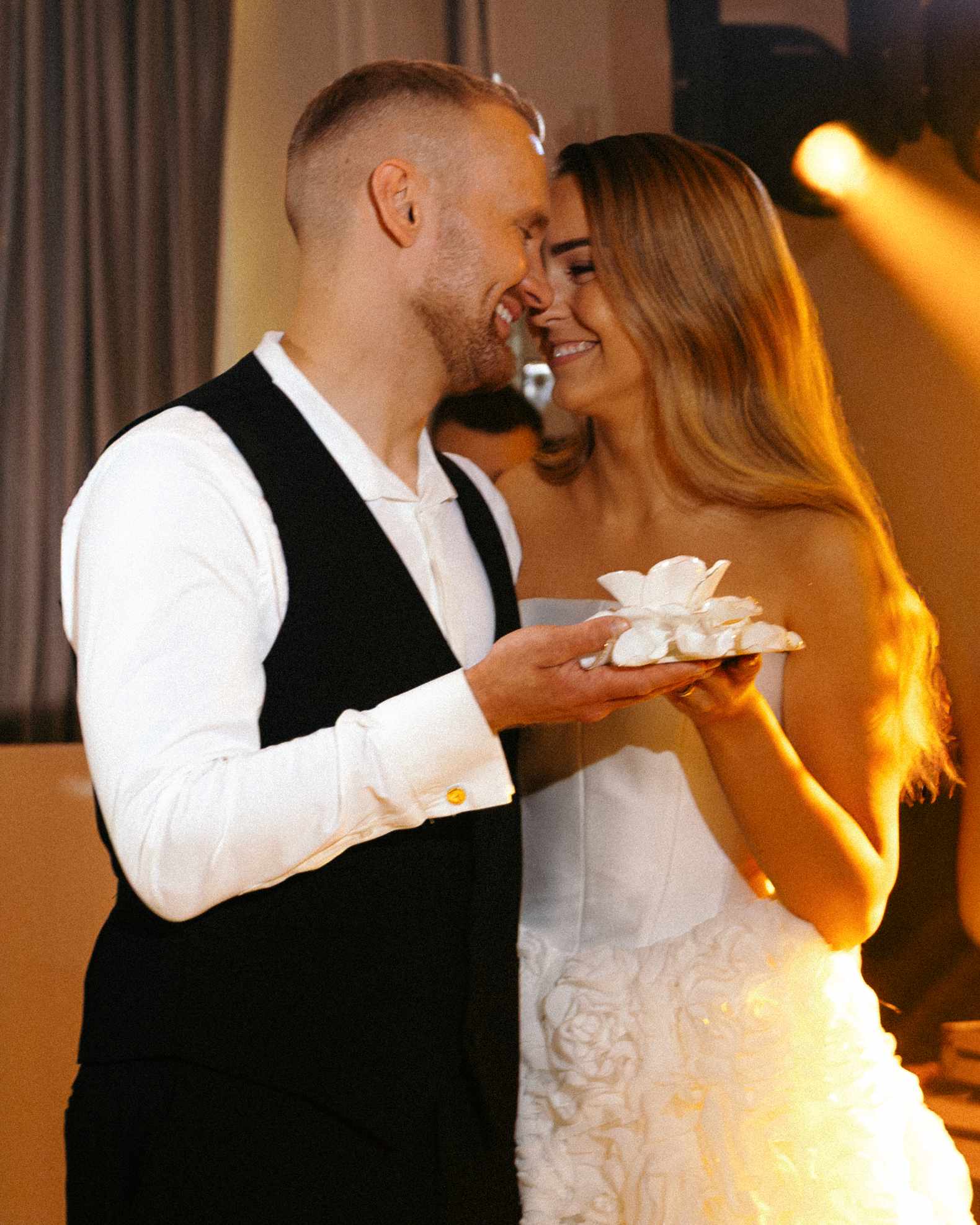 wedding newlyweds holding family hearth
