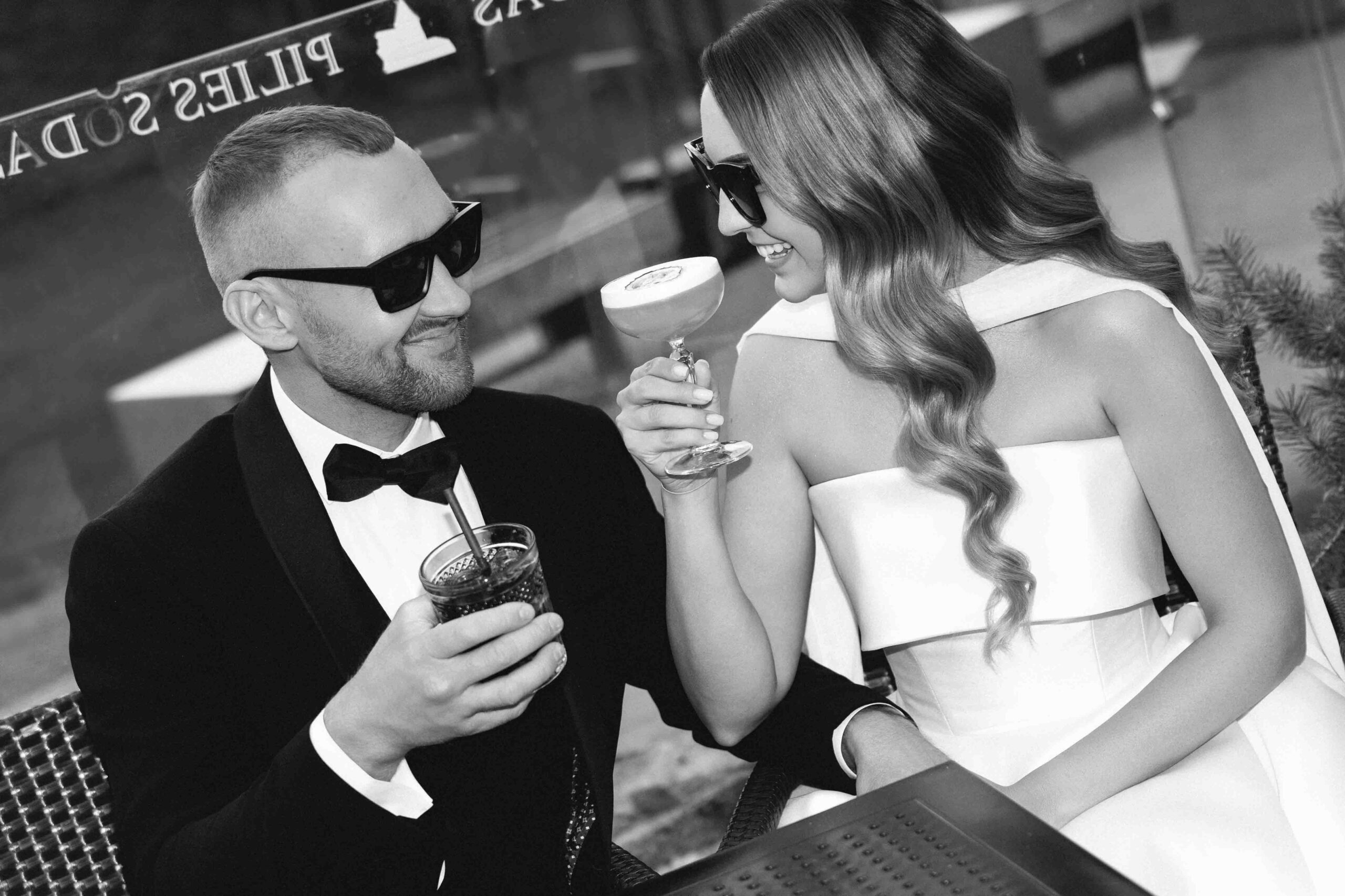 sipping coctails on wedding day happy