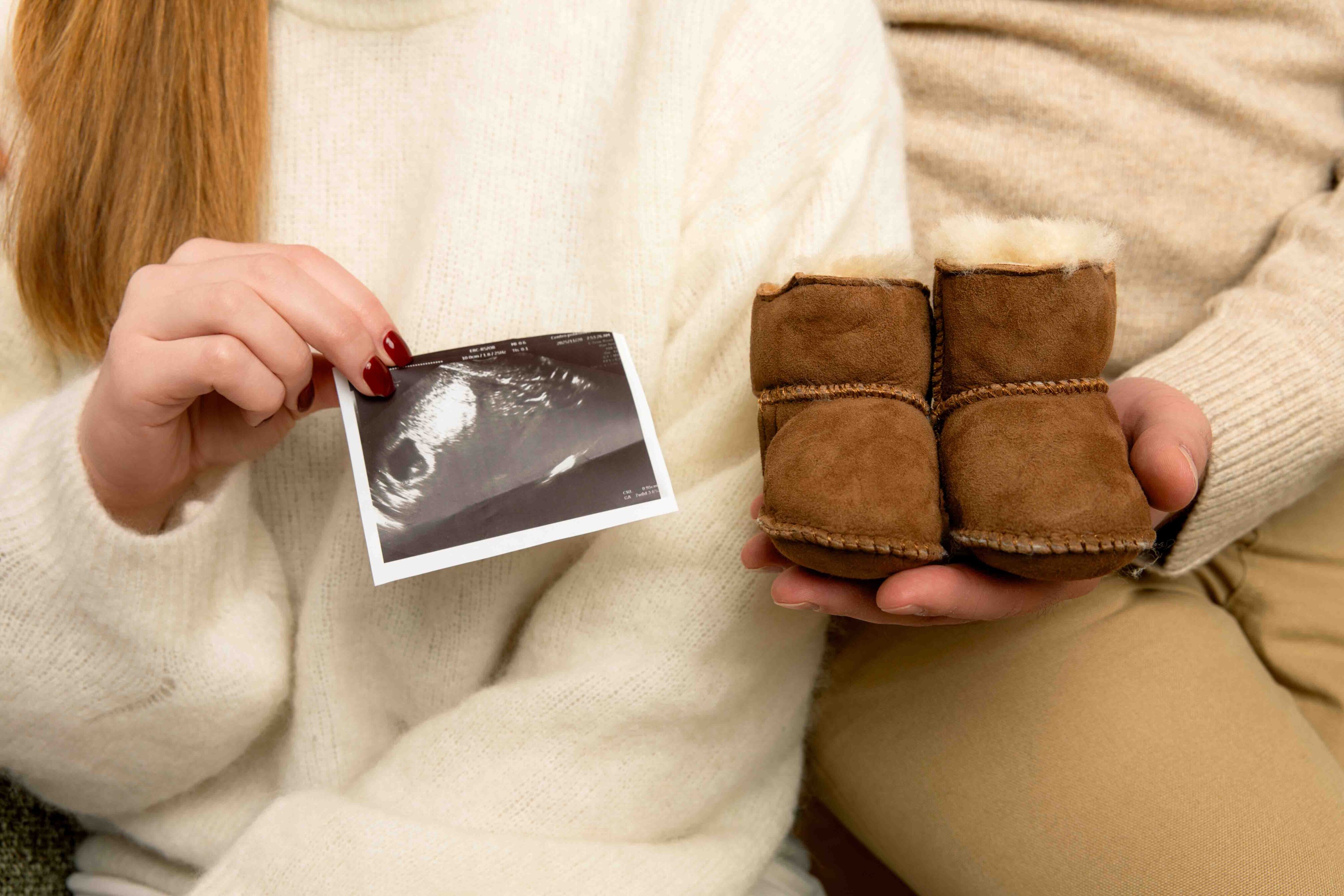 maternity photos ultrasound picture winter little boots uggs