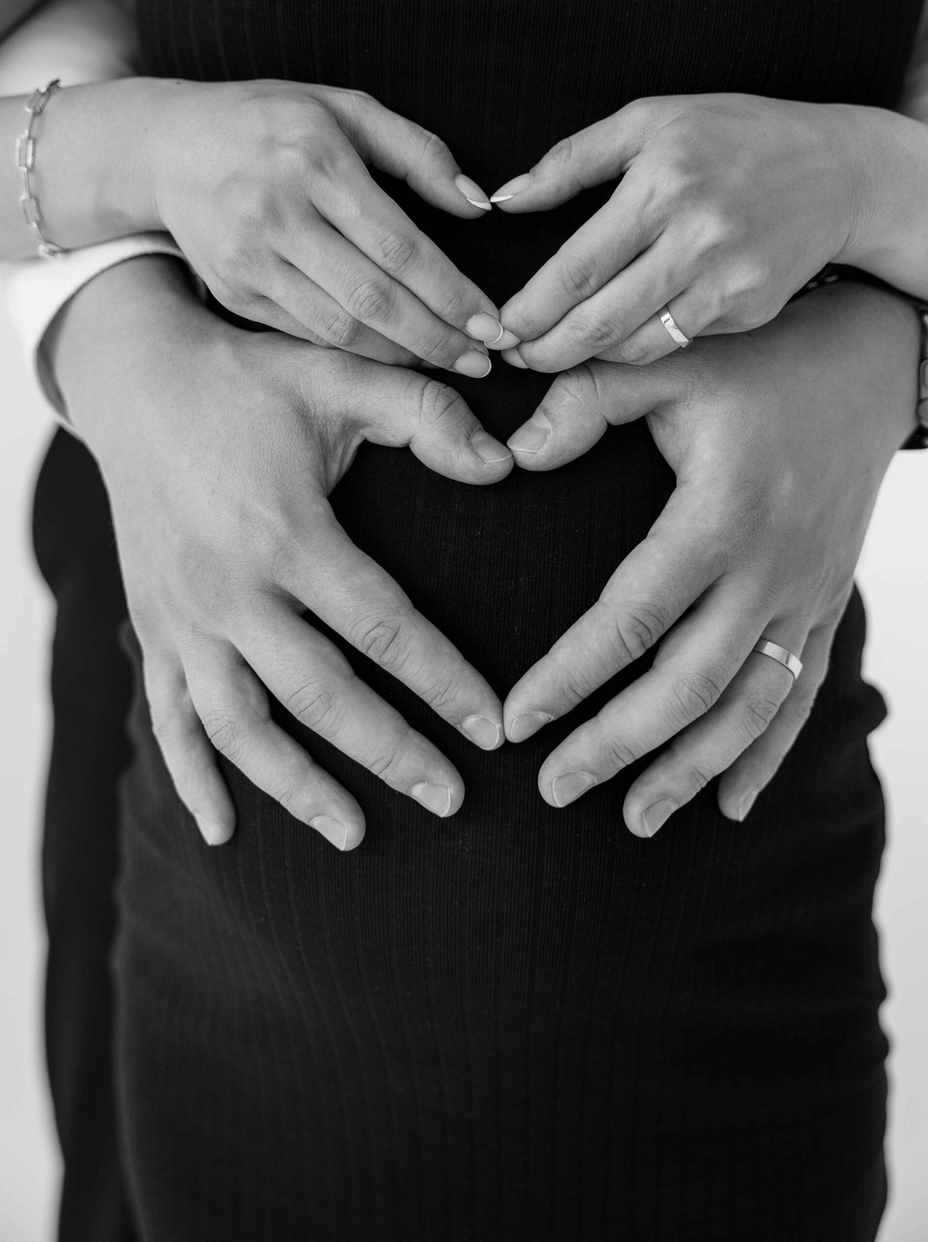 pregnancy photoshoot details heart on belly hands