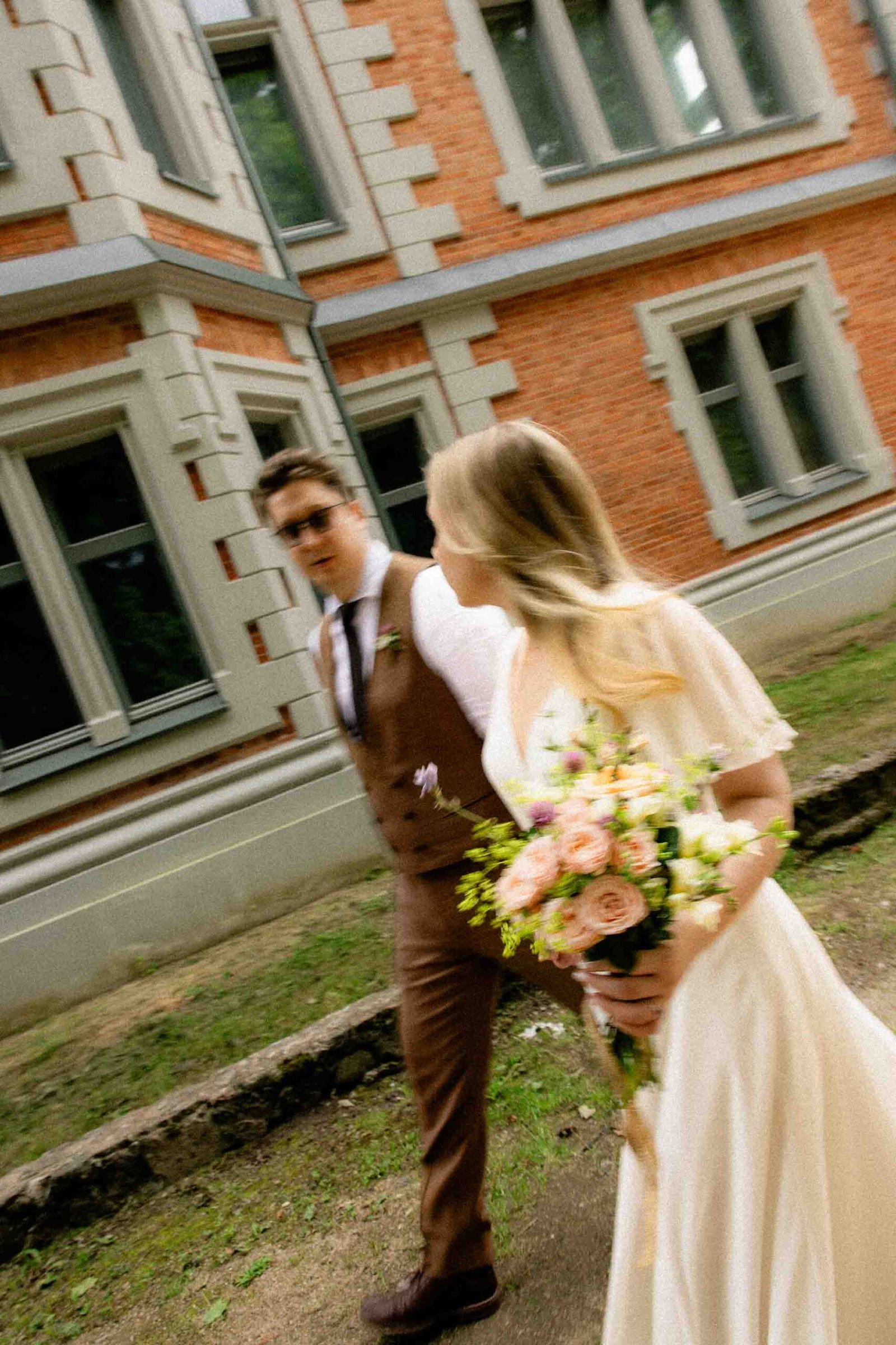 newlyweds in motion walking castle