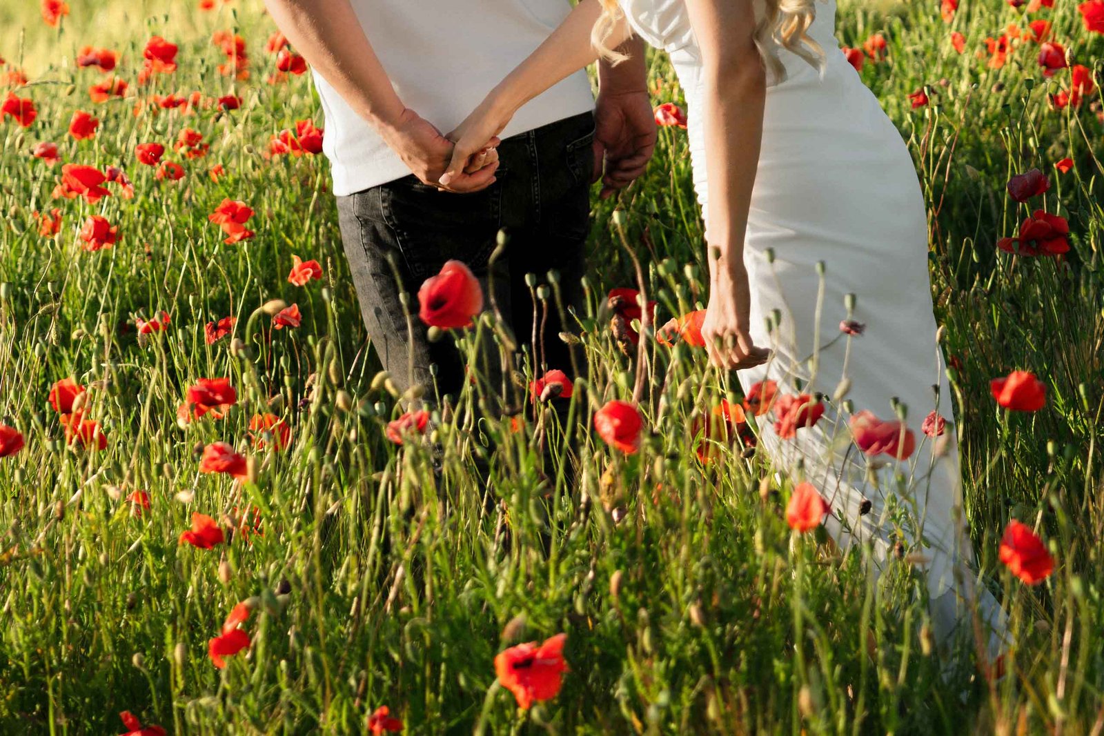 wedding poppy field photoshoot running through field