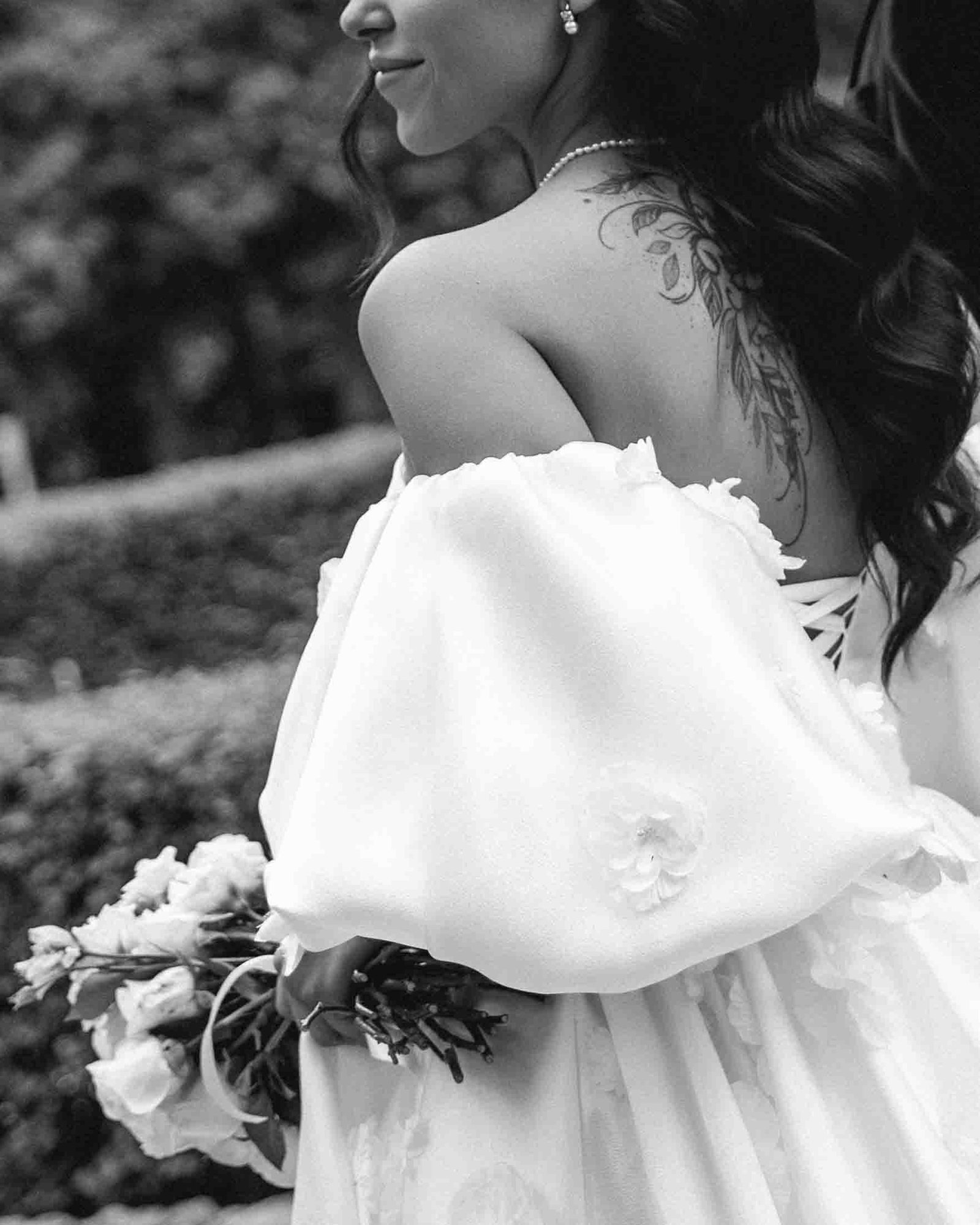 bride closeup shot tattoo on back