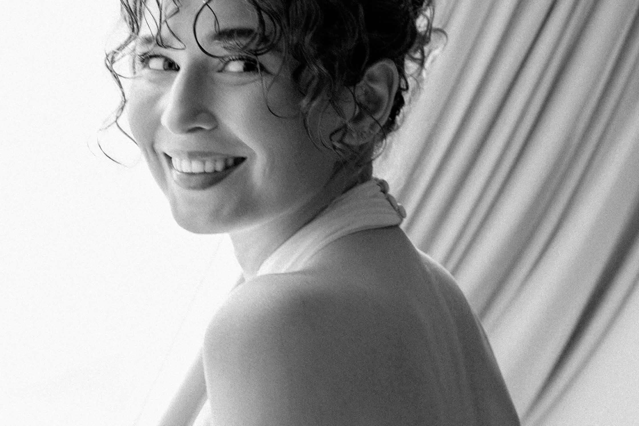 bride portrait close up black and white curly hairstyle