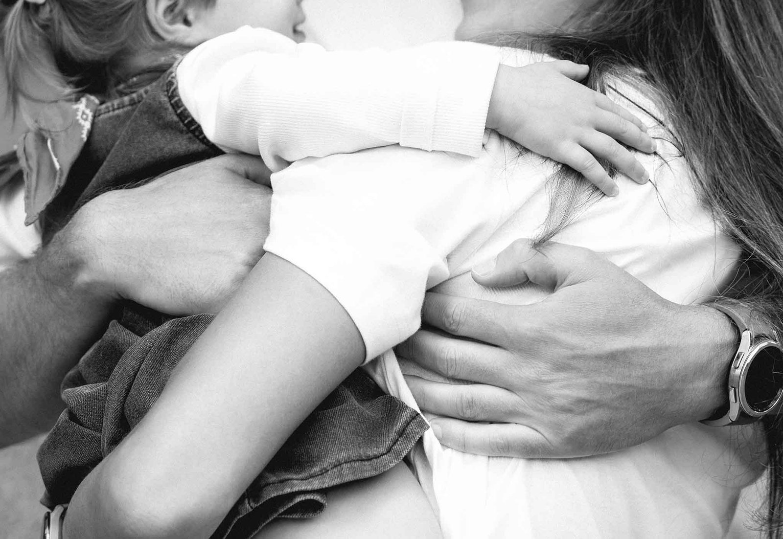 family hug hands detail photo