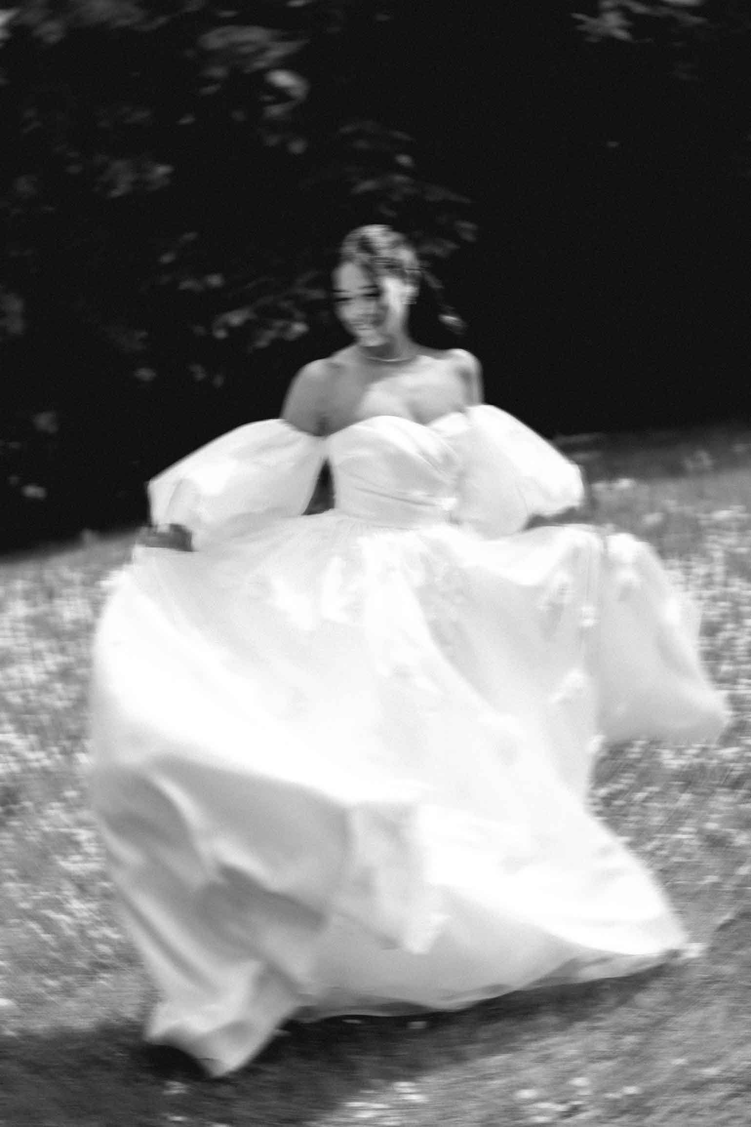 romantic bride photoshoot in flower field blurry movement
