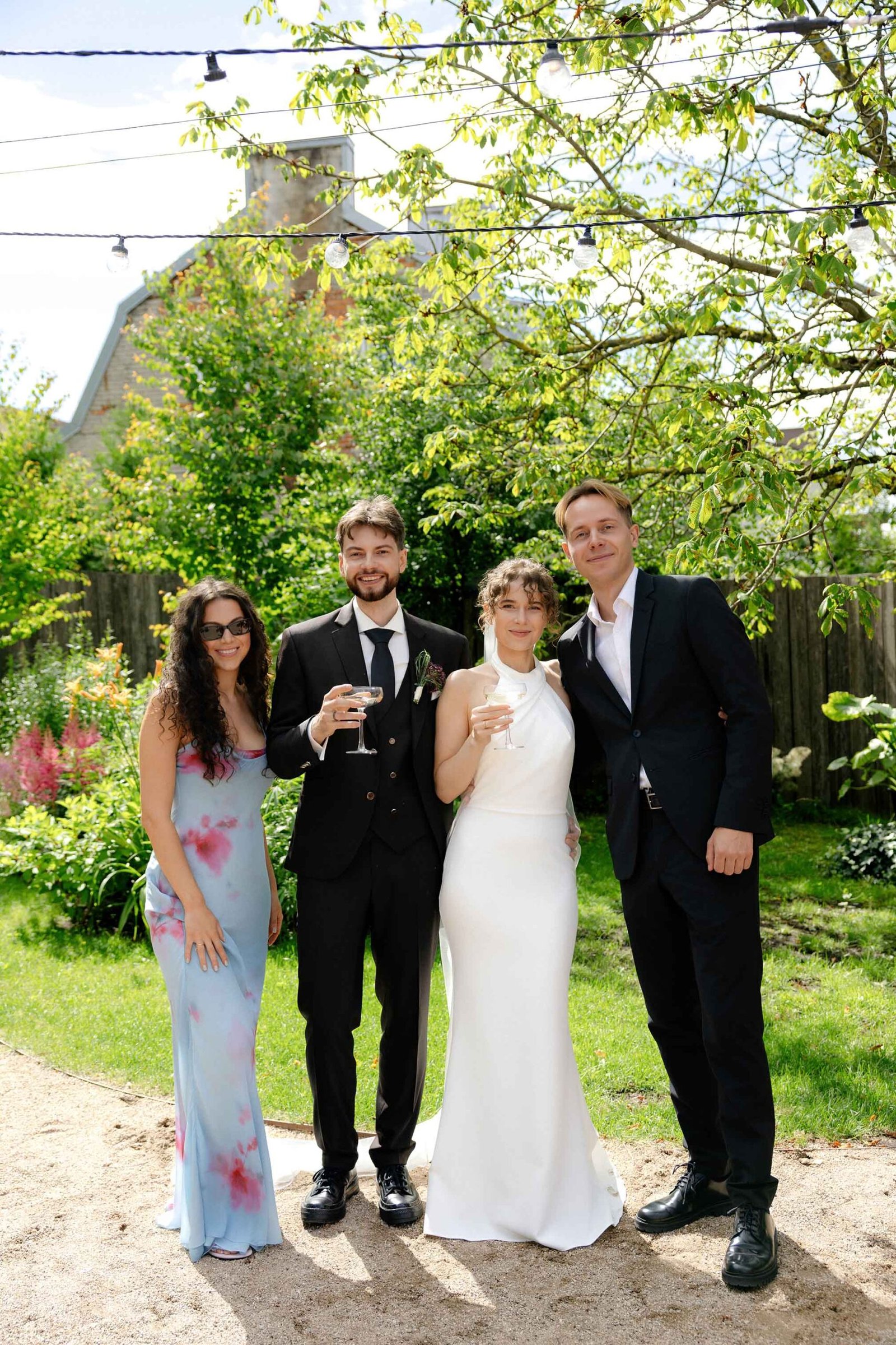 wedding guests group photo coutyard